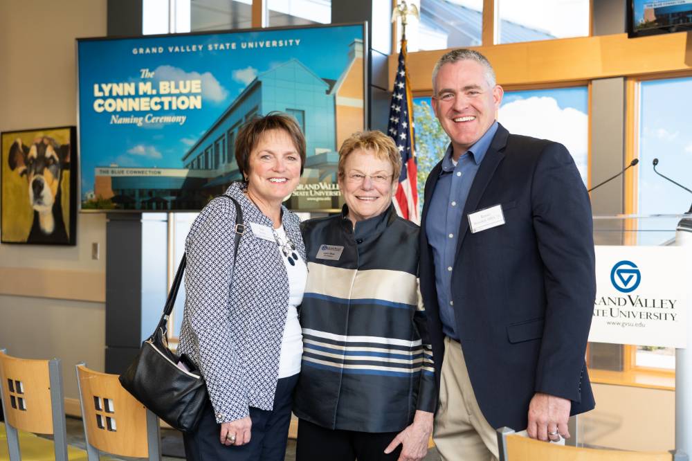Lynn M. Blue posing with guests at the Lynn M. Blue Connection Naming Ceremony